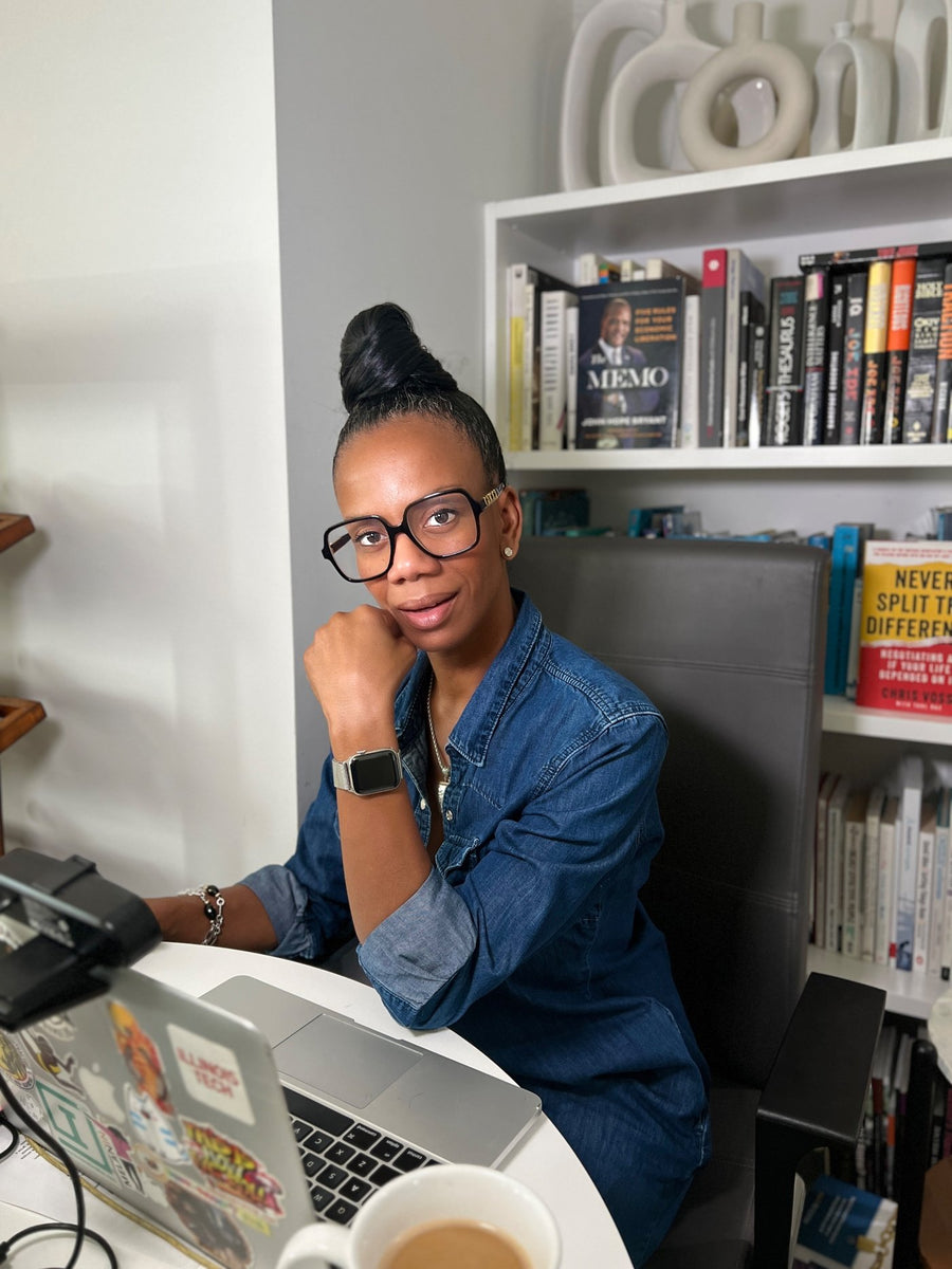 Miss Ronda Jackson, Black woman business coach, at her desk in Los Angeles